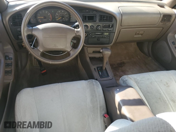 1994 Toyota Camry LE z VIN JT2GK12EXR0070117, wystawiony jako Copart lot #75997244 z przebiegiem 185 759 mil mil oraz Czysty tytuł • Clean title. Historia ofert i sprzedaży dostępna na DreamBid. Obrazek 8.
