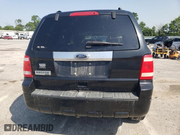 2010 Ford Escape Limited with VIN 1FMCU0E79AKA45236, listed as a Copart auction lot 60406005 with 237,385 mi miles and Salvage title. Bid and sale history available at DreamBid. Image 6.