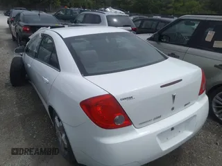 2010 Pontiac G6 1SB z VIN 1G2ZA5E04A4127584, wystawiony jako IAAI lot #36772381 z przebiegiem Nie podano mil oraz . Historia ofert i sprzedaży dostępna na DreamBid. Obrazek 3.