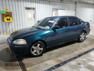 1997 Honda Civic LX with VIN 1HGEJ6572VL027980, listed as a Copart auction lot 53024335 with 269,396 mi miles and Salvage Title. Bid and sale history available at carsss.com. Image 1.