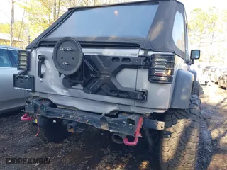 2015 Jeep Wrangler Unlimited Rubicon Hard Rock with VIN 1C4HJWFG1FL777222, listed as a IAAI auction lot 41843893 with 74,718 mi miles. Bid and sale history available at carsss.com. Image 6.