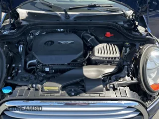 2015 MINI Hardtop 4 Door with VIN WMWXS5C5XFT831166, listed as a Copart auction lot 56714285 with 69,668 mi miles and Salvage Title. Bid and sale history available at DreamBid. Image 7.