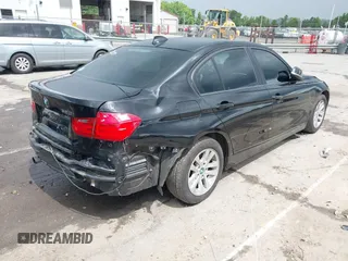 2014 BMW 3 Series 320i with VIN WBA3B1G52ENS80039, listed as a IAAI auction lot 42253717 with 104,388 mi miles and . Bid and sale history available at DreamBid. Image 4.