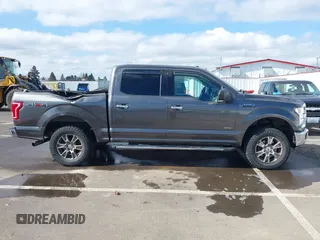 2015 Ford F-150 XLT with VIN 1FTEW1EG1FKE89277, listed as a IAAI auction lot 41752106 with 142,069 mi miles. Bid and sale history available at carsss.com. Image 13.