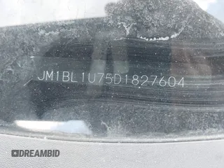 2013 Mazda 3 i Sport with VIN JM1BL1U75D1827604, listed as a IAAI auction lot 42240344 with 18,526 mi miles and . Bid and sale history available at DreamBid. Image 9.