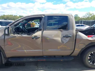 2021 Nissan Titan Pro-4X with VIN 1N6AA1ED4MN531369, listed as a IAAI auction lot 40597122 with 32,161 mi miles and . Bid and sale history available at DreamBid. Image 14.