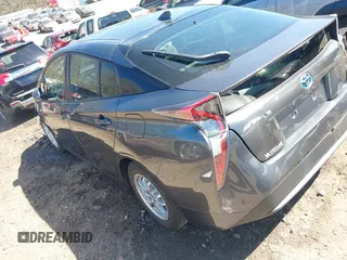 2017 Toyota Prius Two with VIN JTDKBRFU4H3036656, listed as a IAAI auction lot 41823354 with 59,233 mi miles and . Bid and sale history available at carsss.com. Image 3.