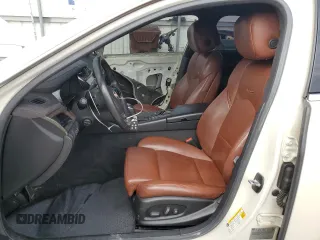 2014 Cadillac CTS Premium AWD with VIN 1G6AZ5S35E0156897, listed as a Copart auction lot 55838595 with 124,999 mi miles and Salvage title. Bid and sale history available at DreamBid. Image 7.
