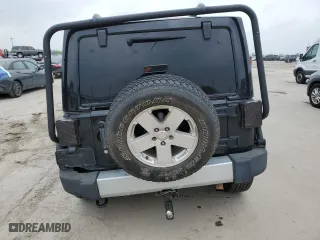 2011 Jeep Wrangler Unlimited Sahara with VIN 1J4HA5H13BL546703, listed as a Copart auction lot 51521845 with 127,132 mi miles and Salvage Title. Bid and sale history available at carsss.com. Image 6.