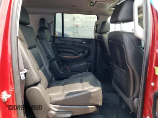 2015 Chevrolet Suburban LTZ with VIN 1GNSKKKC6FR556105, listed as a Copart auction lot 64034304 with 106,269 mi miles and Salvage Title. Bid and sale history available at DreamBid. Image 11.