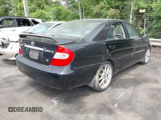 2003 Toyota Camry LE with VIN JTDBF32K430146557, listed as a IAAI auction lot 42102454 with 179,653 mi miles. Bid and sale history available at carsss.com. Image 4.