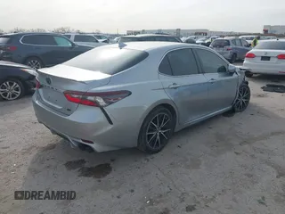 2023 Toyota Camry SE with VIN 4T1G11AK7PU786752, listed as a IAAI auction lot 41737747 with 39,872 mi miles and . Bid and sale history available at DreamBid. Image 4.