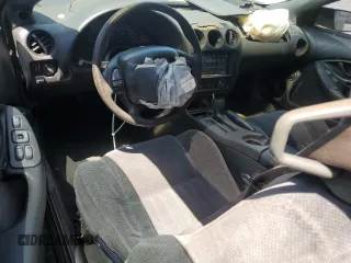 1999 Pontiac Firebird Formula z VIN 2G2FV22G4X2233748, wystawiony jako Copart lot #55693535 z przebiegiem 166 622 mil mil oraz Szkoda całkowita • Salvage title. Historia ofert i sprzedaży dostępna na DreamBid. Obrazek 8.