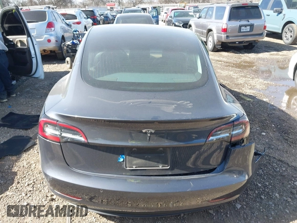 2020 Tesla Model 3 Long Range with VIN 5YJ3E1EB6LF666624, listed as a IAAI auction lot 41720664 with 65,973 mi miles. Bid and sale history available at carsss.com. Image 16.