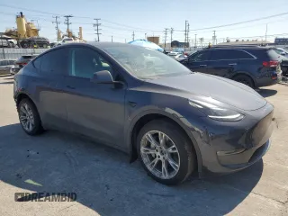 2024 Tesla Model Y Long Range z VIN 7SAYGDEE5RA244641, wystawiony jako Copart lot #51864845 z przebiegiem 23 096 mil mil oraz Szkoda całkowita • Salvage title. Historia ofert i sprzedaży dostępna na DreamBid. Obrazek 4.