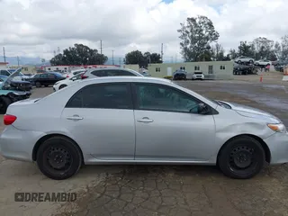 2012 Toyota Corolla L with VIN 2T1BU4EE9CC803165, listed as a IAAI auction lot 41924436 with 257,724 mi miles. Bid and sale history available at carsss.com. Image 13.