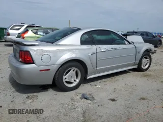 2003 Ford Mustang Standard с VIN 1FAFP40413F437836, выставлен на аукционе Copart как лот 58623395 с пробегом Не указан миль и Чистый • Clean title. История ставок и продаж доступна на DreamBid. Изображение 3.