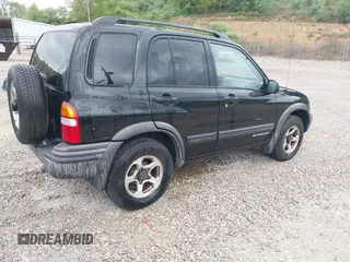 2004 Chevrolet Tracker ZR2 with VIN 2CNBJ734646907924, listed as a IAAI auction lot 42088809 with 98,797 mi miles and . Bid and sale history available at DreamBid. Image 4.
