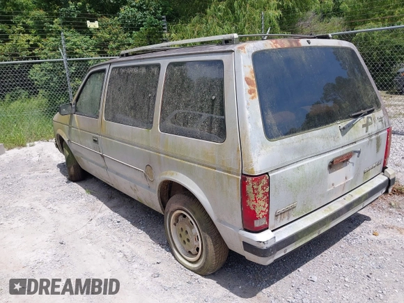 1987 Dodge Caravan z VIN 2B4FK41G3HR127301, wystawiony jako IAAI lot #42393563 z przebiegiem Nie podano mil oraz . Historia ofert i sprzedaży dostępna na DreamBid. Obrazek 3.