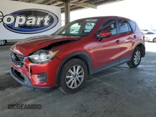 2016 Mazda CX-5 Sport z VIN JM3KE2BY8G0837203, wystawiony jako Copart lot #54960845 z przebiegiem 116 656 mil mil oraz Szkoda całkowita • Salvage title. Historia ofert i sprzedaży dostępna na DreamBid. Obrazek 1.
