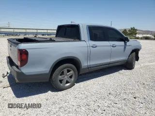 2022 Honda Ridgeline RTL-E with VIN 5FPYK3F79NB024459, listed as a Copart auction lot 59165445 with 21,429 mi miles and Salvage title. Bid and sale history available at DreamBid. Image 3.