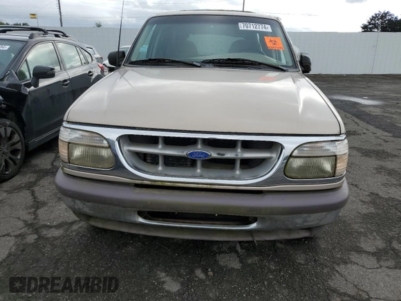 1997 Ford Explorer XLT with VIN 1FMDU35PXVZB69793, listed as a Copart auction lot 70712774 with 138,243 mi miles and Salvage title. Bid and sale history available at DreamBid. Image 5.