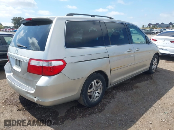 2005 Honda Odyssey EX-L with VIN 5FNRL38655B002926, listed as a IAAI auction lot 42137025 with 209,863 mi miles. Bid and sale history available at carsss.com. Image 4.