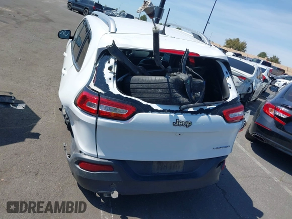 2016 Jeep Cherokee High Altitude with VIN 1C4PJLDB0GW249558, listed as a IAAI auction lot 41851549 with 128,638 mi miles. Bid and sale history available at carsss.com. Image 17.