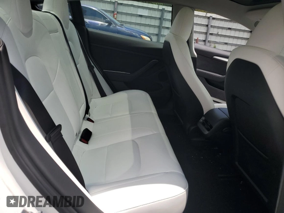 2023 Tesla Model 3 z VIN 5YJ3E1EA5PF580945, wystawiony jako Copart lot #58139125 z przebiegiem 19 057 mil mil oraz Szkoda całkowita • Salvage title. Historia ofert i sprzedaży dostępna na DreamBid. Obrazek 11.