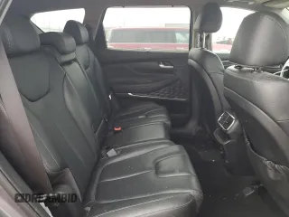 2019 Hyundai Santa Fe Ultimate z VIN 5NMS5CAD7KH001629, wystawiony jako Copart lot #50974415 z przebiegiem 197 585 mil mil oraz Szkoda całkowita • Salvage title. Historia ofert i sprzedaży dostępna na DreamBid. Obrazek 11.