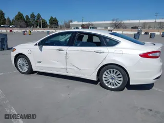 2013 Ford Fusion Energi Titanium with VIN 3FA6P0SU3DR273676, listed as a IAAI auction lot 41777822 with 189,283 mi miles. Bid and sale history available at carsss.com. Image 6.