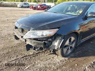 2013 Kia Optima Hybrid EX with VIN KNAGM4AD4D5040177, listed as a IAAI auction lot 40496029 with Not Provided miles. Bid and sale history available at carsss.com. Image 12.
