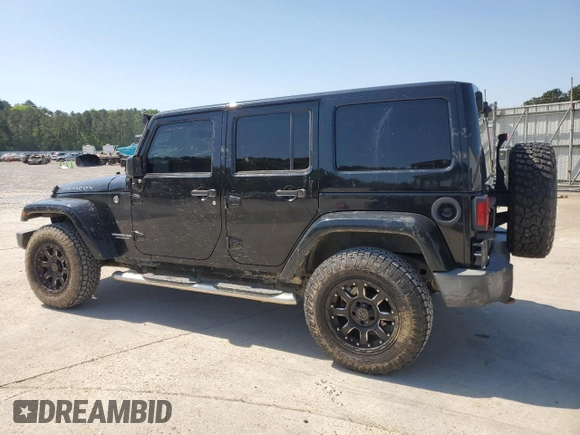 2016 Jeep Wrangler Unlimited Rubicon with VIN 1C4BJWFG5GL290757, listed as a Copart auction lot 52099225 with 102,424 mi miles and Salvage title. Bid and sale history available at DreamBid. Image 2.
