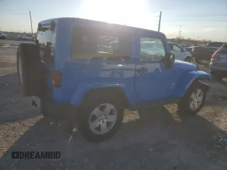 2011 Jeep Wrangler Sahara with VIN 1J4GA5D15BL632709, listed as a Copart auction lot 84118104 with 87,644 mi miles and Salvage Title. Bid and sale history available at DreamBid. Image 3.