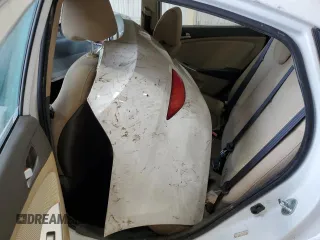 2014 Hyundai Accent GLS z VIN KMHCT4AE9EU709379, wystawiony jako Copart lot #54667835 z przebiegiem Nie podano mil oraz Szkoda całkowita • Salvage title. Historia ofert i sprzedaży dostępna na DreamBid. Obrazek 10.