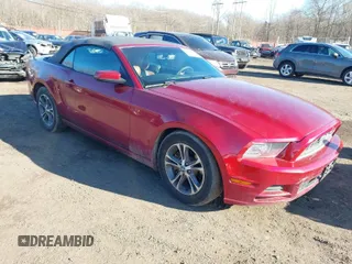 2014 Ford Mustang V6 with VIN 1ZVBP8EMXE5228061, listed as a IAAI auction lot 41603552 with 118,011 mi miles. Bid and sale history available at carsss.com. Image 1.