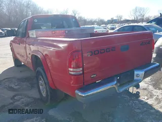1999 Dodge Dakota SLT with VIN 1B7GG22Y3XS289253, listed as a IAAI auction lot 41283728 with 154,038 mi miles and . Bid and sale history available at carsss.com. Image 3.