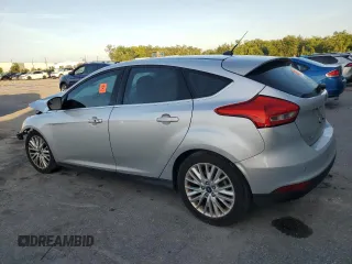 2016 Ford Focus Titanium with VIN 1FADP3N2XGL376941, listed as a Copart auction lot 60560185 with 147,985 mi miles and Salvage title. Bid and sale history available at DreamBid. Image 2.