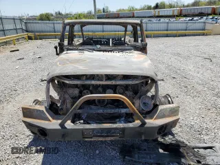 2012 Jeep Wrangler Unlimited Call of Duty MW3 с VIN 1C4BJWFG1CL262643, выставлен на аукционе Copart как лот 53474945 с пробегом Не указан миль и На запчасти • Non repairable. История ставок и продаж доступна на DreamBid. Изображение 5.