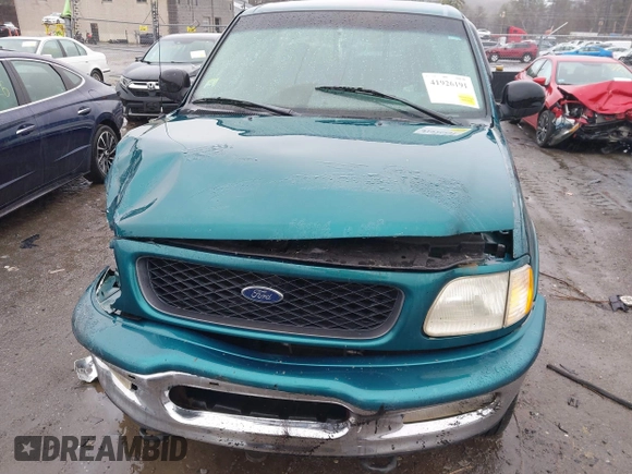 1998 Ford F-150 with VIN 1FTZF08W9WKC01424, listed as a IAAI auction lot 41926191 with 191,424 mi miles and . Bid and sale history available at DreamBid. Image 12.