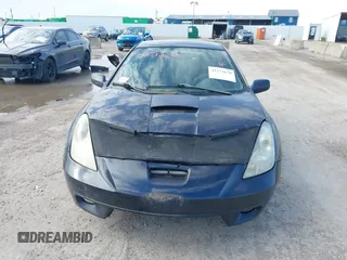 2000 Toyota Celica GT z VIN JTDDR32T1Y0053060, wystawiony jako IAAI lot #41572670 z przebiegiem 258 437 mil mil oraz . Historia ofert i sprzedaży dostępna na DreamBid. Obrazek 6.