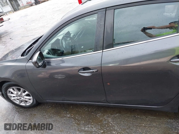 2014 Mazda 3 i Touring with VIN JM1BM1L76E1184728, listed as a IAAI auction lot 41962258 with 200,544 mi miles and . Bid and sale history available at DreamBid. Image 14.