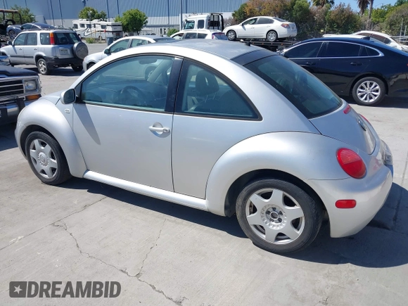 2001 Volkswagen Beetle GLS with VIN 3VWCD21C11M412672, listed as a IAAI auction lot 42336934 with 145,667 mi miles and . Bid and sale history available at DreamBid. Image 3.