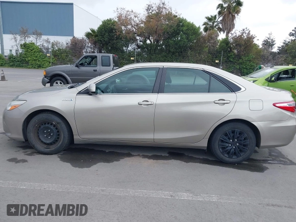 2015 Toyota Camry LE with VIN 4T1BD1FK4FU165560, listed as a IAAI auction lot 42135474 with 422,041 mi miles and . Bid and sale history available at DreamBid. Image 14.