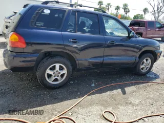 2004 Hyundai Santa Fe GLS with VIN KM8SC13E94U713339, listed as a Copart auction lot 51162085 with 164,357 mi miles and Salvage Title. Bid and sale history available at carsss.com. Image 3.