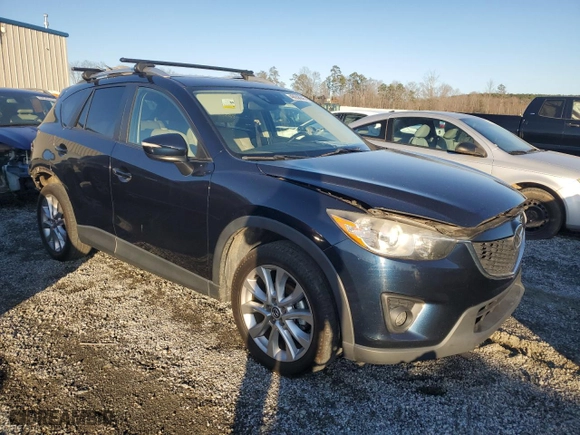 2015 Mazda CX-5 Grand Touring with VIN JM3KE2DY6F0511329, listed as a Copart auction lot 48656945 with 203,540 mi miles and Salvage Title. Bid and sale history available at carsss.com. Image 4.