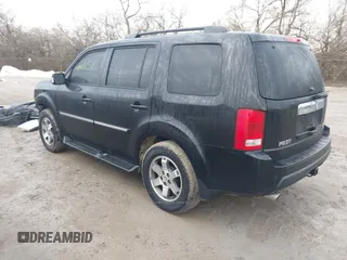 2011 Honda Pilot Touring with VIN 5FNYF4H94BB089930, listed as a IAAI auction lot 41477596 with 171,831 mi miles. Bid and sale history available at carsss.com. Image 3.