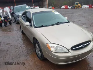 2000 Ford Taurus SEL with VIN 1FAFP56S0YA168888, listed as a IAAI auction lot 41555916 with 170,672 mi miles and . Bid and sale history available at DreamBid. Image 6.