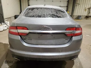2015 Jaguar XF with VIN SAJXJ0EF1F8U48283, listed as a Copart auction lot 81004054 with 77,828 mi miles and Clean Title. Bid and sale history available at DreamBid. Image 6.