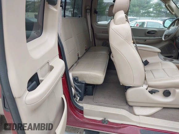 2003 Ford F-150 XL with VIN 1FTRX18L43NA96018, listed as a IAAI auction lot 41871947 with 208,517 mi miles. Bid and sale history available at carsss.com. Image 8.